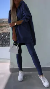 Women's two-piece navy blue tracksuit set featuring an oversized hoodie and leggings