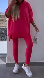 Full view of women's fuchsia two-piece tracksuit with side-slit hoodie and leggings