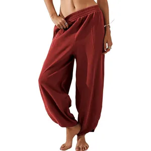 Detailed close-up of women's loose casual lantern pants with elastic waist and pockets