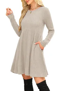 Detail showing the ribbed fabric texture and functional pockets of the high-waisted dress