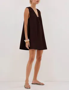 Elegant deep V-neck sleeveless pleated trapeze dress in dark brown coffee color