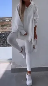 White sports casual two-piece set featuring a hooded slit sweatshirt and matching leggings