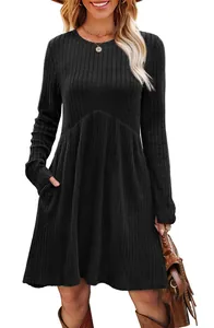 Detailed shot of a black ribbed long-sleeve dress with high waist and pockets