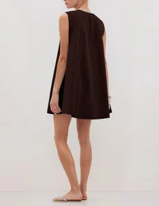 Back view of a minimalist dark brown sleeveless A-line mini dress with wide straps
