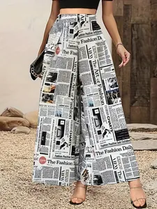High-waisted wide-leg trousers with monochrome newspaper print and flowy relaxed fit