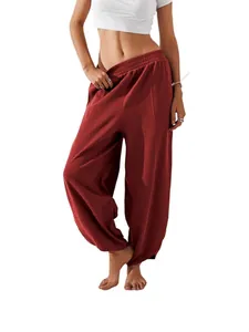 Stylish women's brick red lantern pants featuring elastic waist and cozy oversized fit