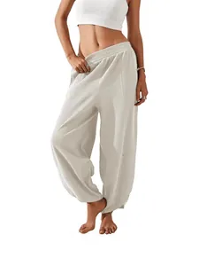 Women's off-white loose lantern pants with elastic waist and side pockets for casual wear
