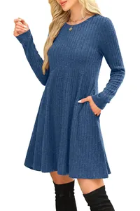 Detail of blue ribbed long-sleeve dress featuring high-waisted cut and side pockets.