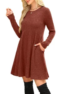 Close-up of a brown long-sleeved ribbed dress featuring a high waist and side pockets.