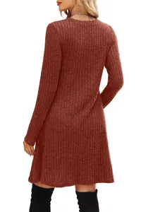 Back view detail of a long-sleeved round neck ribbed mini dress in rust red color.