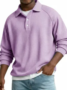Detail shot showing the purple waffle texture and button polo collar of the long sleeve shirt.