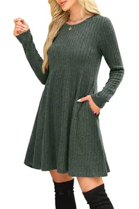 Detail view of dark green ribbed long sleeve dress featuring handy side pockets.