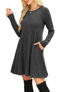 Detail view of charcoal gray ribbed long sleeve dress with high waist and pockets.