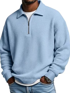 Men's retro light blue waffle-knit polo shirt featuring a half-zip and polo collar