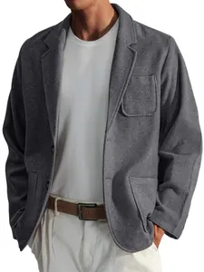 Close-up of grey textured casual jacket showing pocket detail and fabric quality