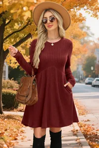 Full view detail of a wine red ribbed long sleeve dress with pockets in autumn