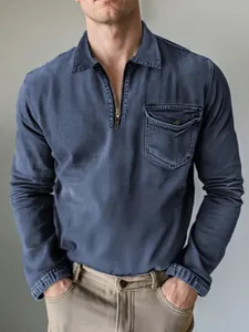 Classic men's blue denim shirt featuring half-zip lapel collar and chest pocket detail