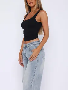 Side profile detail of a premium slim-fit black double-layer tank top for women
