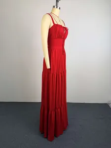 Elegant red tiered maxi dress with pleated bodice and high waist design shown on mannequin