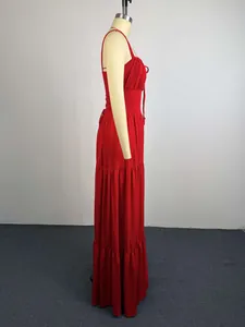 Side view of a red elegant pleated high-waist maxi dress on a mannequin.