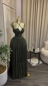 Elegant pleated floor-length maxi dress with criss-cross halter straps in dark olive green