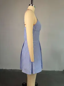Side view detail of a blue and white striped A-line camisole dress on a tailor mannequin