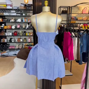 Detailed back view of a blue and white striped A-line camisole dress with irregular hem