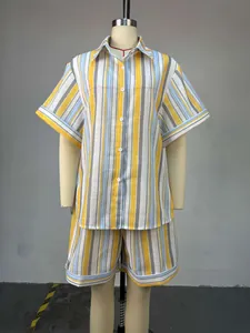 Detailed view of a yellow and blue striped short-sleeve shirt and shorts set on a mannequin
