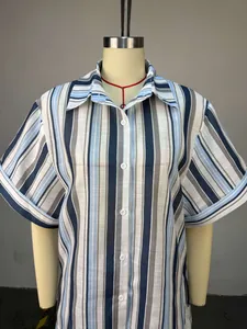 Detail view of a vertical striped short-sleeve shirt with a classic button-down collar