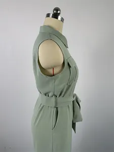 Detailed side view of sage green sleeveless jumpsuit with lapel collar and waist tie
