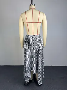 Back view of high-waist A-line midi skirt with black and white geometric pattern