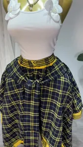 High-waist yellow plaid A-line skirt with unique wrap-around tie-front design detail