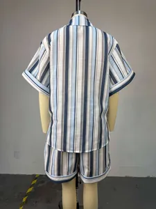 Back view of a women's blue and white striped shirt and shorts two-piece set on a mannequin.