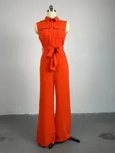 Orange sleeveless wide-leg jumpsuit with lapel pockets and waist tie on mannequin
