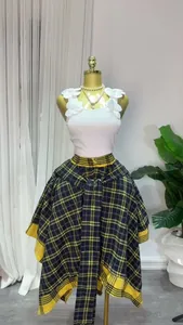 Detailed view of an asymmetrical high-waist plaid A-line skirt with tie-waist on a mannequin.