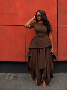Elegant women's brown short-sleeve dress featuring a high waist and irregular layered hem