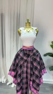 Detail view of a high-waisted pink plaid A-line skirt with an irregular tie-waist design.