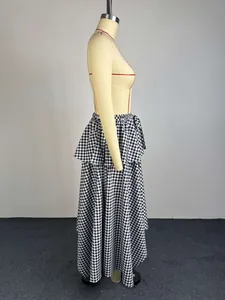 Side view of tiered black and white gingham midi skirt on mannequin