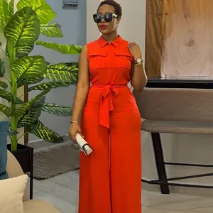 Full view of vibrant orange sleeveless collared wide-leg jumpsuit for summer style