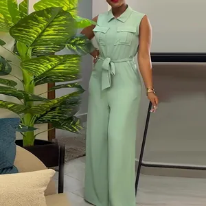 Detail of a mint green sleeveless wide-leg jumpsuit with lapel collar and belt