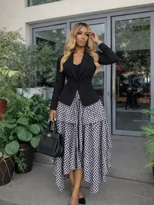 Detailed view of high waist black and white gingham irregular hem A-line skirt