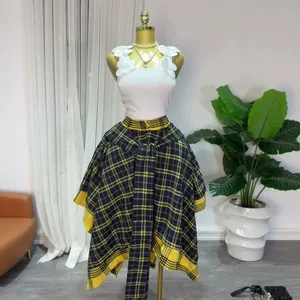 Chic high-waisted plaid A-line skirt featuring an irregular hem and a stylish front tie-waist