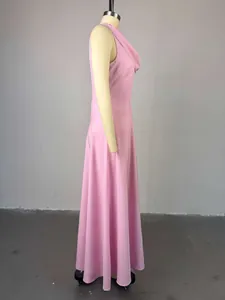 Detailed side view of an elegant pink sleeveless midi dress on a studio mannequin