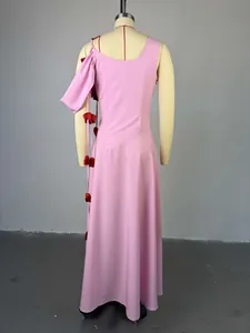 Back view of pink off-shoulder midi dress with red heart-shaped dangling accents