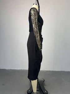 Elegant black midi dress featuring delicate lace long sleeves and a slimming high waist