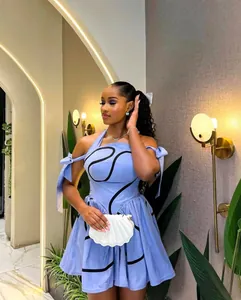 Blue halter neck mini dress with black line print and off-shoulder tie sleeves for summer.