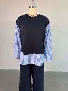Detailed view of the fashionable striped patchwork top and high-waist pants leisure set
