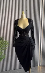 Elegant black midi dress featuring delicate lace long sleeves and sophisticated draped waist detail