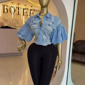 Light blue eyelet embroidered crop shirt featuring rhinestone lantern sleeves design