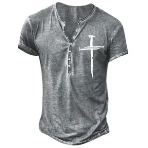 Close-up detail of men's casual gray Henley T-shirt with a white cross graphic print
